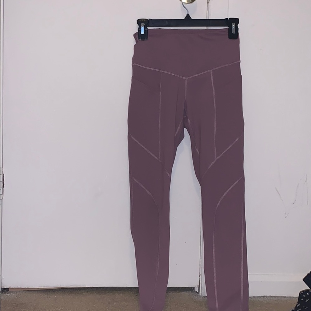 Long purple workout leggings with pockets